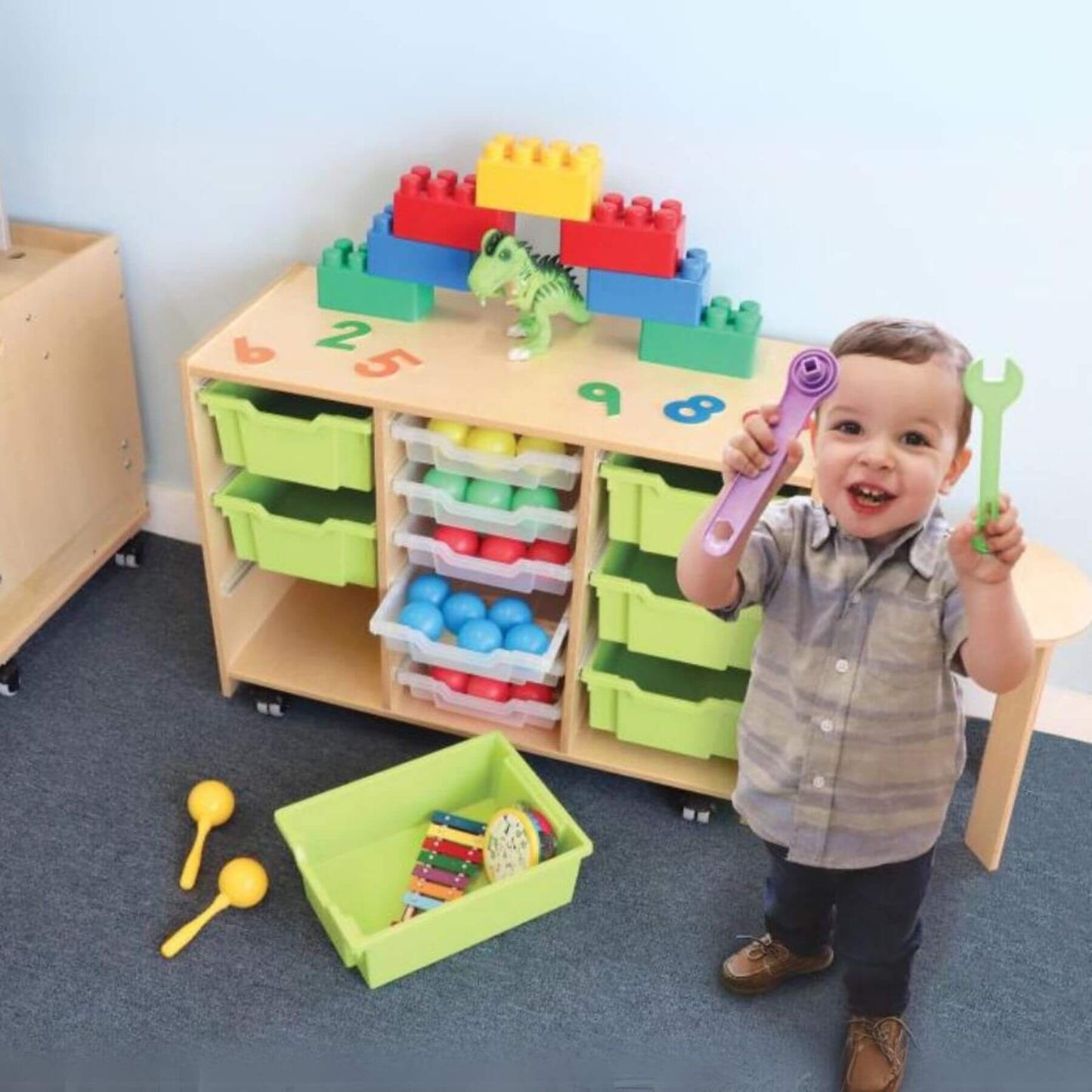 Boy Playing near Whitney Brothers Whitney Plus Green Tray Storage Cabinet