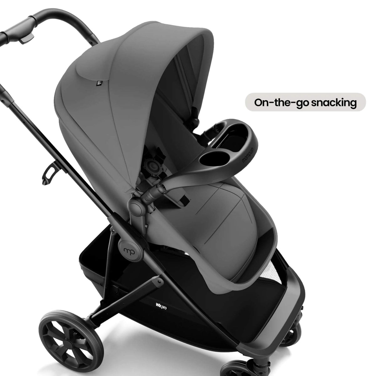 A stroller in dark gray and black with an integrated seat, canopy, and cup holder, shown on a clean white background with a text label that reads 'On-the-go snacking'.
