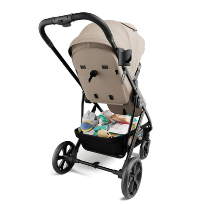 Mompush Wiz Pro - Khaki with baby items in the underseat basket