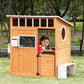 Boy Playing inside of Outsunny Wooden Playhouse for Kids Light Brown