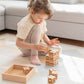 Girl Playing Tiny Land® Wooden Alphabet Blocks