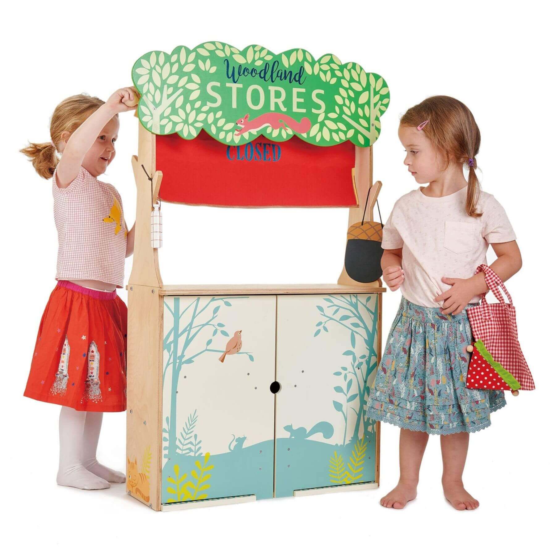 Children playing with Tender Leaf Woodland Stores and Theater