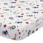Fitted sheet with animal and sports pattern on a white background