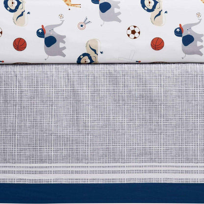 Crib sheet with animal and sports ball pattern on a textured fabric background